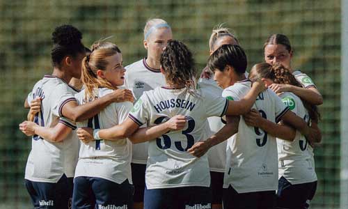 West Ham United women's team celebrate scoring a goal